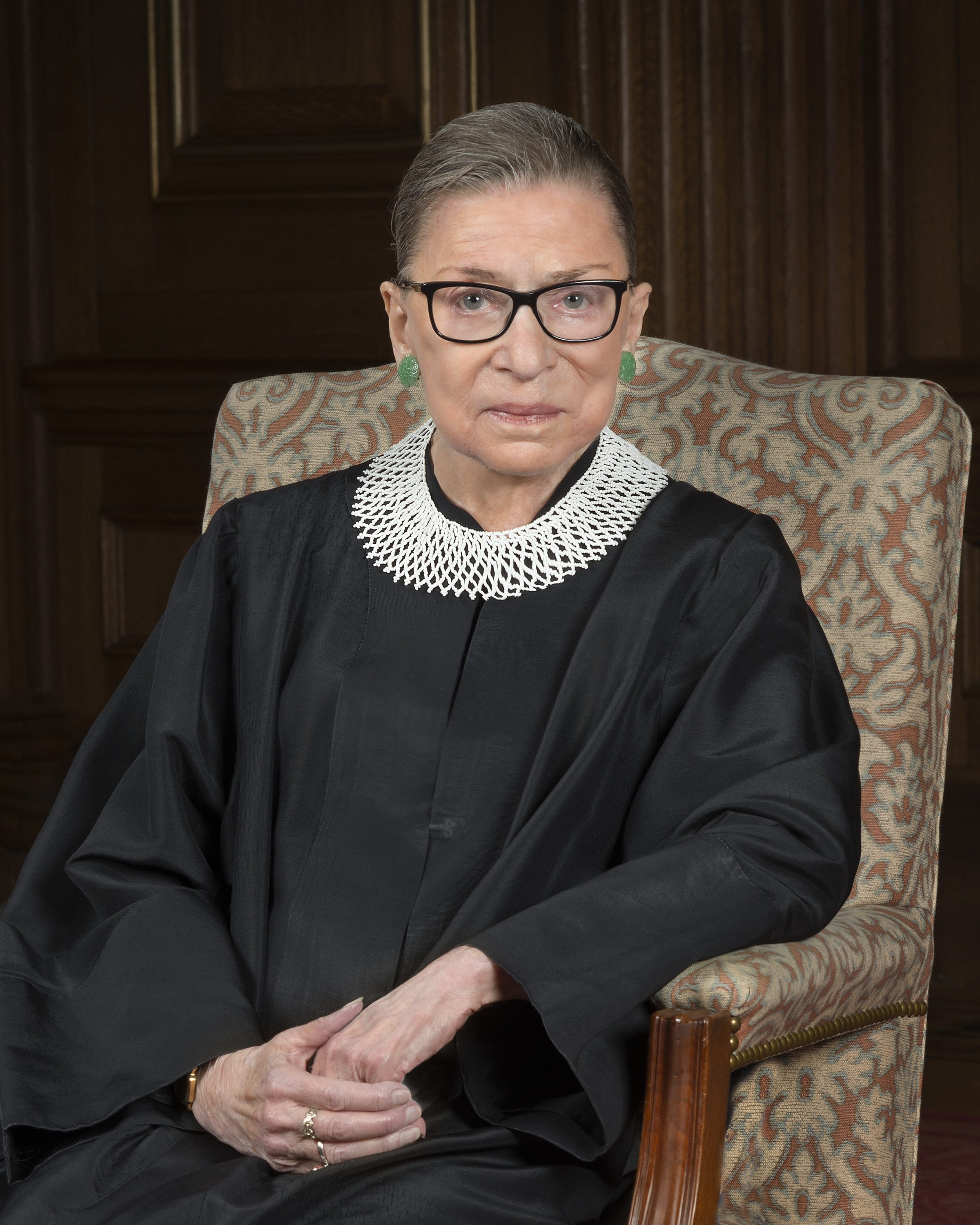 A photo of Justice Ruth Bader Ginsberg looking seriously at the camera